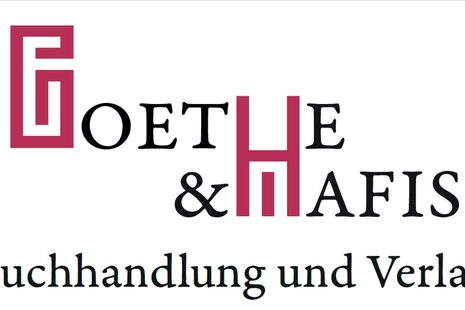 На этой фотографии изображен логотип книжного магазина Goethe & Hafis. Он представляет собой надпись.